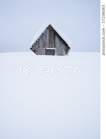 Fabulous winter house with snowy roof Fabulous winter house with snowy roof 57206065