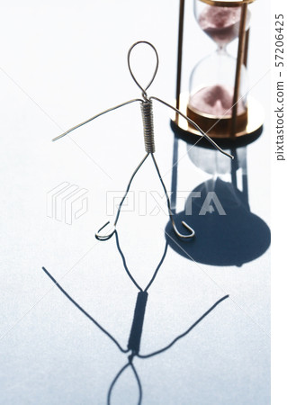 Man Against Hourglass Man Against Hourglass 57206425