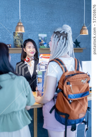 Tourist guide receptionist who guides the latest shopping information popular with visitors to Japan 57208676