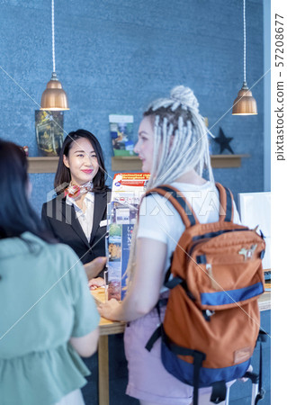 Tourist guide receptionist who guides the latest shopping information popular with visitors to Japan 57208677
