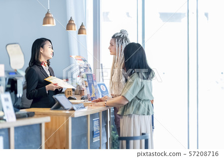 Young female staff at tourist information offices for foreigners who are in demand 57208716