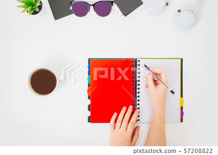 Flatlay with female home office workspace. 57208822