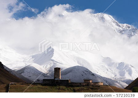Church of Lamaria and the peak of Mount Shkhara in Church of Lamaria and the peak of Mount Shkhara in 57210139