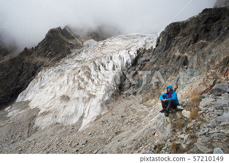 Tourist in the mountains of the Caucasian range 57210149