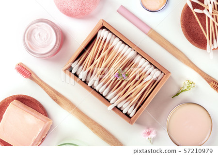 Plastic-free, zero waste products, flat lay on a white background. Bamboo toothbrushes and cotton 57210979
