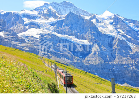 Scenery and climbing train near Jungfrau, Switzerland Scenery and climbing train near Jungfrau, Switzerland 57217268