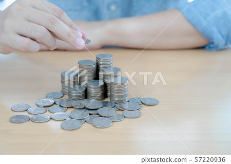 A Businessman Savings Counting Coins A Businessman Savings Counting Coins 57220936