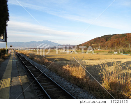 Unmanned station on local line in autumn Unmanned station on local line in autumn 57221555