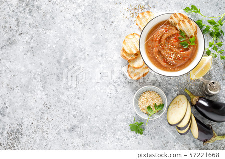 Eggplant hummus with ingredients for cooking Eggplant hummus with ingredients for cooking 57221668