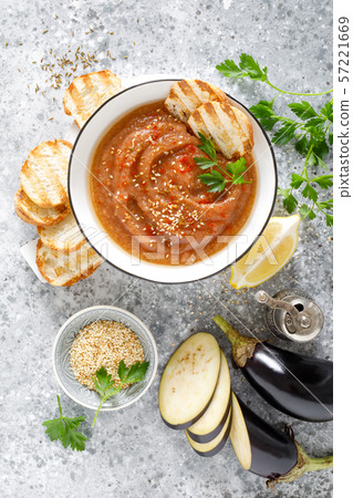 Eggplant hummus with ingredients for cooking Eggplant hummus with ingredients for cooking 57221669