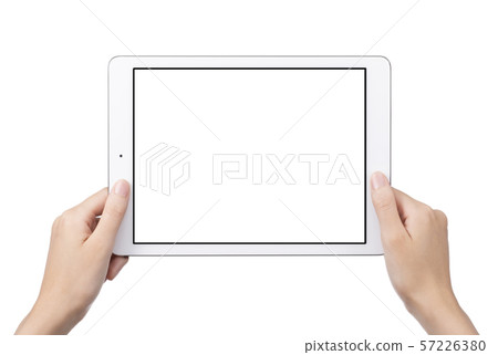 Image of holding tablet device with both hands Image of holding tablet device with both hands 57226380