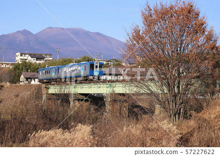 Koumi Line sightseeing train crosses the iron bridge / (Yatsugatake Kogen Line) 57227622