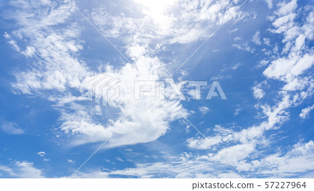 Cloudy blue sky nature background 57227964