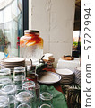 Glass cup and glass bottle water inside the cafe 57229941