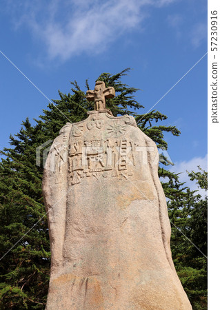 Christianized menhir of Saint-Uzec in Brittany Christianized menhir of Saint-Uzec in Brittany 57230916