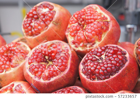 Pomegranate fruits is displayed for sale in the market..  57233657