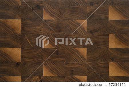 Texture of walnut end grain cutting board with oil finish 57234151
