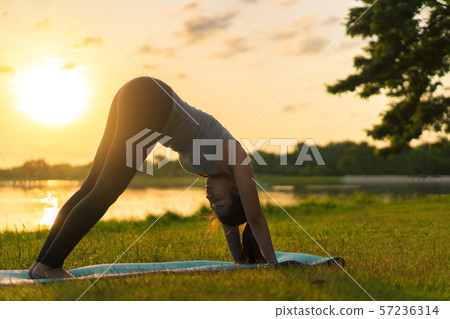 Young asian woman wearing exercise suit and Young asian woman wearing exercise suit and 57236314