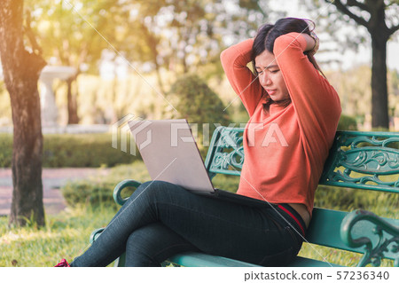 Happy young asian woman be smile working with her 57236340