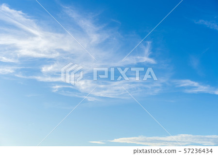 Blue sky and white puffy clouds 57236434