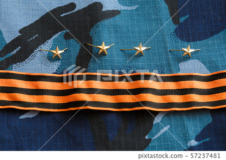 Gold stars, St. George ribbon on blue camouflage 57237481