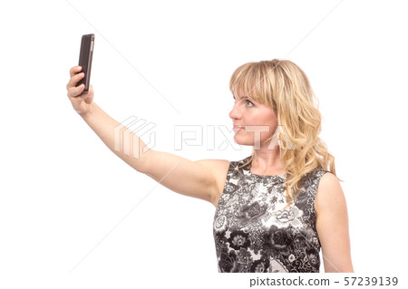 Beautiful woman taking self picture with smartphone camera 57239139