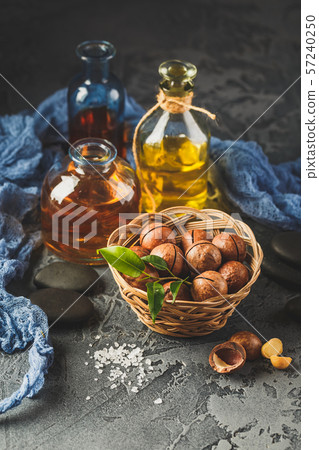 Natural macadamia oil in a glass bottle with 57240250