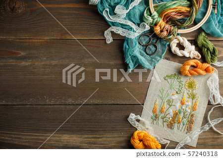Sewing accessories on wooden background 57240318