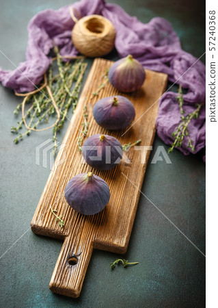 Juicy fig fruits on a dark background 57240368