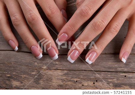 Manicure on a retro wooden background. 57241155