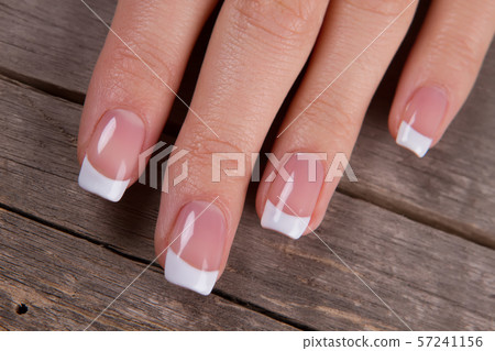 Close-up of female fingers. 57241156