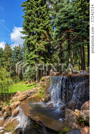 Cascading Waterfall in Landscape Park in Warsaw Cascading Waterfall in Landscape Park in Warsaw 57242514