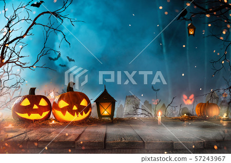 Halloween pumpkins on dark spooky forest. Halloween pumpkins on dark spooky forest. 57243967