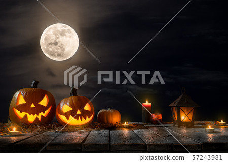 Halloween pumpkins on dark spooky forest. Halloween pumpkins on dark spooky forest. 57243981