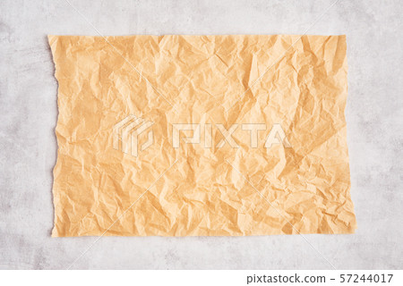 Crumpled piece of brown parchment or baking paper Crumpled piece of brown parchment or baking paper 57244017