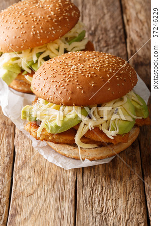 Spicy Chipotle Chicken Cemita Sandwich close-up. Spicy Chipotle Chicken Cemita Sandwich close-up. 57246229