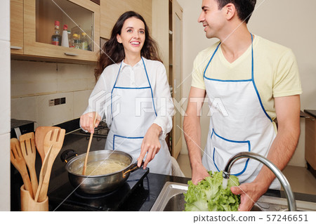 Woman enjoying cooking with husband 57246651