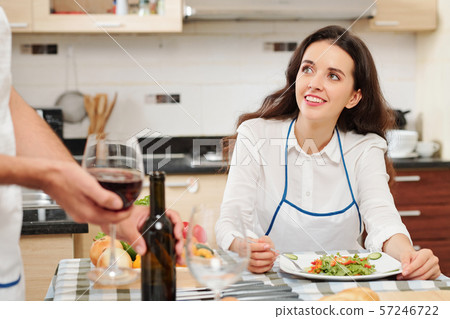 Pretty woman eating at home Pretty woman eating at home 57246722