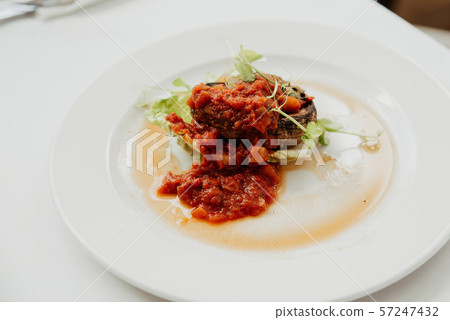 close up on stuffed baked mushroom, portabello close up on stuffed baked mushroom, portabello 57247432