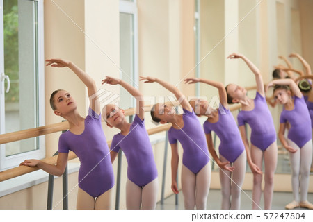 Girls training at classical ballet class. 57247804