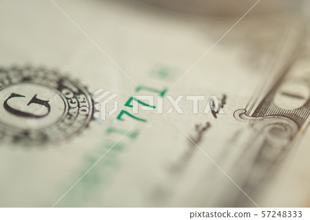 Macro view on one dollar banknbote Macro view on one dollar banknbote 57248333