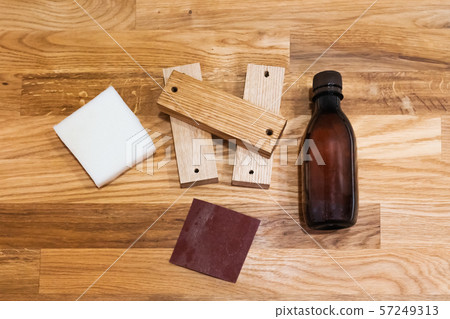 Wood furniture care kit on the Oak oiled wood plank table 57249313
