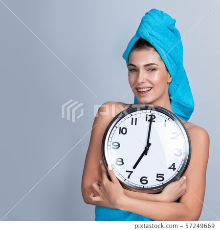 Woman in towel on head 57249669