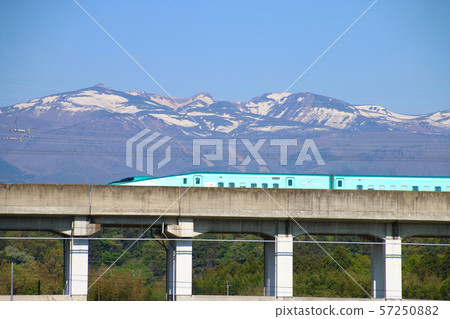 Shinkansen and Mt. Adachi (Nihonmatsu City, Fukushima Prefecture) 57250882