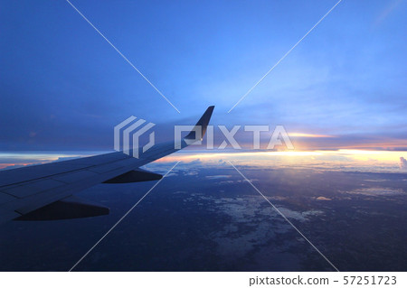 aircraft wing flying over beautiful clouds 57251723
