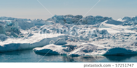Iceberg and ice from glacier in arctic nature landscape in Ilulissat Greenland 57251747