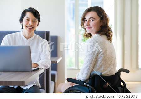 Wheelchair business meeting Wheelchair business meeting 57251975