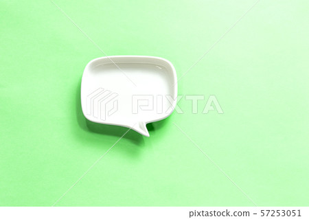 Yellow speech bubble and white speech bubble on the left 57253051