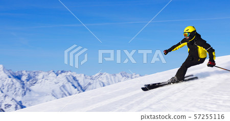 Skier in winter mountains 57255116