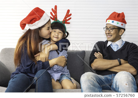 Happy family on holiday and Christmas Happy family on holiday and Christmas 57256760